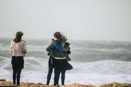 Tel Aviv Israel December 25, 2019 View of unidentified people walking on Herbert Samuel Promenade in Tel Aviv in the afternoonのeditorial素材