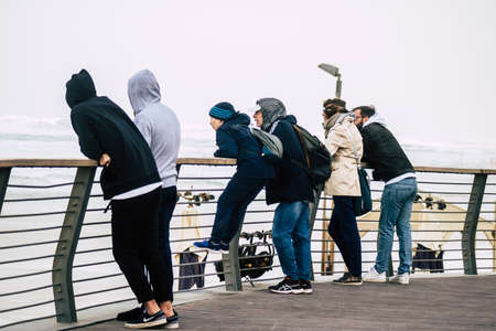 Tel Aviv Israel December 25, 2019 View of unidentified people walking on Herbert Samuel Promenade in Tel Aviv in the afternoonのeditorial素材