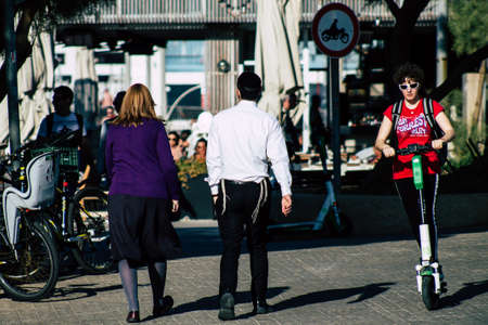 Tel Aviv Israel December 22, 2019 View of unidentified people walking on Herbert Samuel Promenade in Tel Aviv in the afternoonのeditorial素材