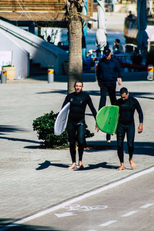 Tel Aviv Israel February 13, 2020 View of unidentified people walking on Herbert Samuel Promenade in Tel Aviv during a sunny day in winterのeditorial素材