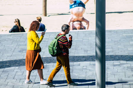 Tel Aviv Israel February 12, 2020 View of unidentified people walking on Herbert Samuel Promenade in Tel Aviv during a sunny day in winterのeditorial素材