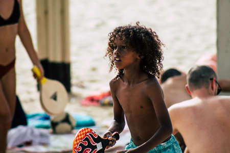 Tel Aviv Israel June 8, 2019 View of unknown Israeli children having fun on the beach of Tel Aviv in the afternoonのeditorial素材