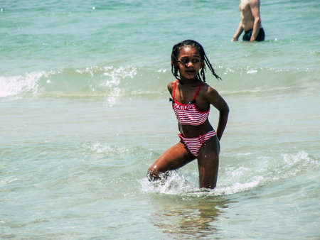Tel Aviv Israel June 9, 2019 View of unknown Israeli children having fun on the beach of Tel Aviv in the afternoonのeditorial素材