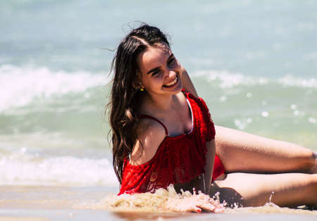Tel Aviv Israel July 6, 2019 View of unknown teen having fun on the beach of Tel Aviv during a sunny day in the afternoonのeditorial素材