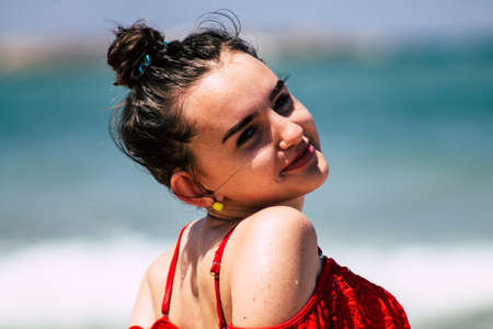 Tel Aviv Israel July 6, 2019 View of unknown teen having fun on the beach of Tel Aviv during a sunny day in the afternoonのeditorial素材