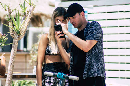 Tel Aviv Israel July 15, 2019 View of unknown Israeli people having fun on the beach of Tel Aviv during a sunny day in the afternoonのeditorial素材
