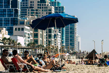 Tel Aviv Israel July 15, 2019 View of unknown Israeli people having fun on the beach of Tel Aviv...