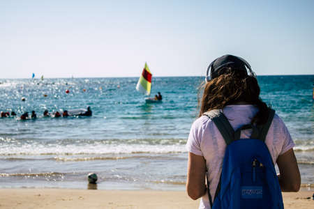 Nahsholim Israel September 27, 2019 View of unknown Israeli people having fun on the beach of Nahsholim during a sunny day in the afternoonのeditorial素材