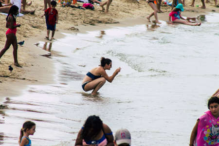 Tel Aviv Israel October 05, 2019 View of unknowns people having fun on the beach of Tel Aviv in the afternoonのeditorial素材