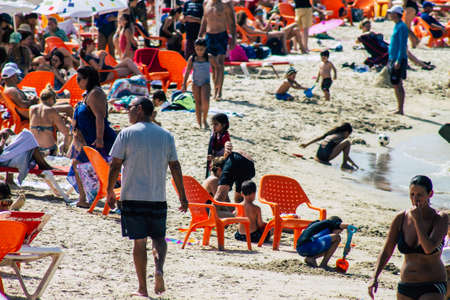 Tel Aviv Israel October 05, 2019 View of unknowns people having fun on the beach of Tel Aviv in the afternoonのeditorial素材