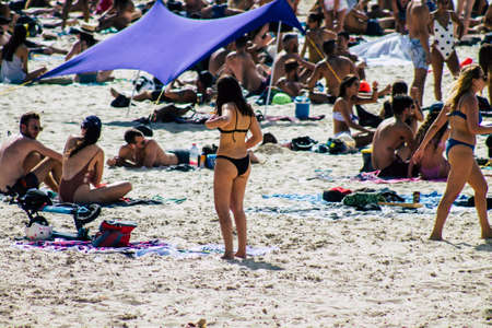 Tel Aviv Israel October 05, 2019 View of unknowns people having fun on the beach of Tel Aviv in the afternoonのeditorial素材