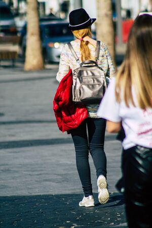 Tel Aviv Israel February 20, 2020 View of unidentified people walking in the streets of Tel Aviv during a sunny day in winterの写真素材