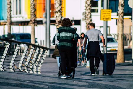 Tel Aviv Israel January 29, 2020 View of unidentified people walking in the streets of Tel Aviv in winterの写真素材