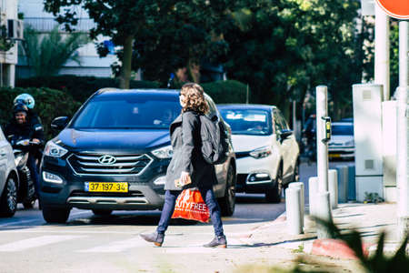 Tel Aviv Israel February 04, 2020 View of unidentified people walking in the streets of Tel Aviv in winterのeditorial素材