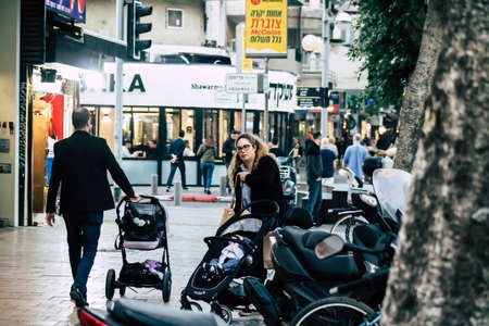 Tel Aviv Israel December 22, 2019 View of unidentified people walking in the streets of Tel Aviv in the afternoonのeditorial素材