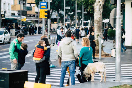 Tel Aviv Israel December 22, 2019 View of unidentified people walking in the streets of Tel Aviv in the afternoonのeditorial素材