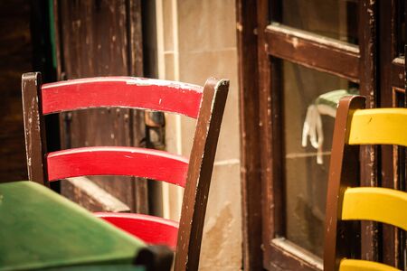 Closeup of chairs from a restaurant located in the old city of Limassol in Cyprus islandの写真素材