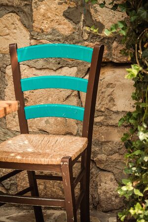 Closeup of chairs from a restaurant located in the old city of Limassol in Cyprus islandの写真素材
