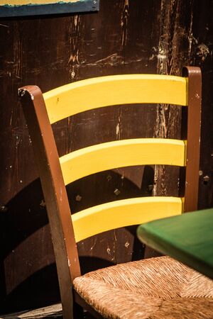Closeup of chairs from a restaurant located in the old city of Limassol in Cyprus islandの写真素材
