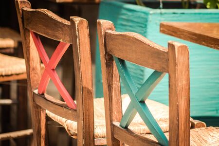 Closeup of chairs from a restaurant located in the old city of Limassol in Cyprus islandの写真素材