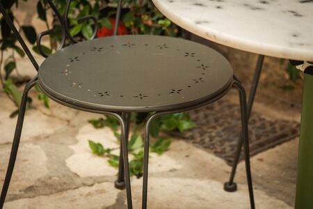 Closeup of chairs and table from a restaurant located in the old city of Limassol in Cyprus island