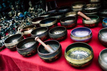 Kathmandu Nepal August 22, 2018 Closeup of Tibetan bowl sold in a souvenir shop at Thamel street in Kathmandu in the morningの写真素材