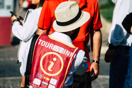 Rome Italy September 29, 2019 View of a tour guide working near the Coliseum also known as the Flavian Amphitheatre in the center of the city of Romeのeditorial素材