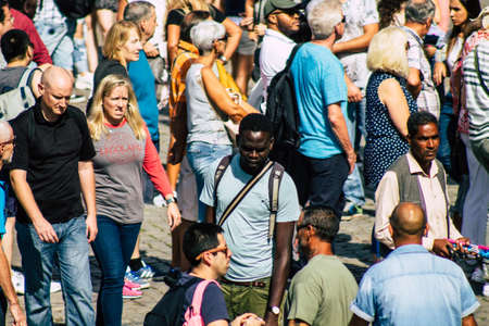 Rome Italy September 29, 2019 View of unknowns street vendor working front the Coliseum also known as the Flavian Amphitheatre in the center of the city of Romeのeditorial素材
