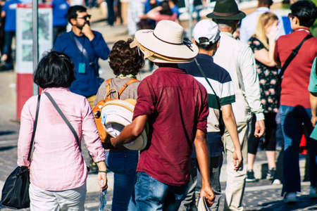 Rome Italy September 29, 2019 View of unknowns street vendor working front the Coliseum also known as the Flavian Amphitheatre in the center of the city of Romeのeditorial素材