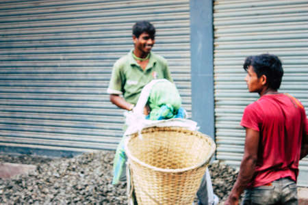 Kathmandu Nepal August 24, 2018 View of unknowns Nepali worker building a new house in Durbar street in Kathmandu in the morningのeditorial素材