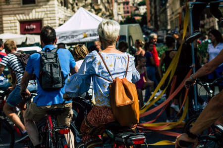 Rome Italy September 29, 2019 View of unknowns tourist visiting the city of Rome in bicycle in the eveningのeditorial素材