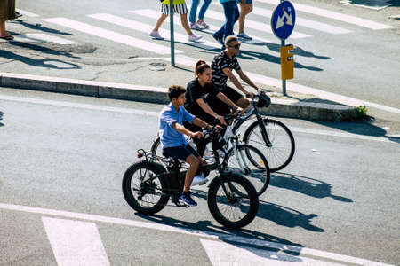 Rome Italy September 29, 2019 View of unknowns tourist visiting the city of Rome in bicycle in the eveningのeditorial素材
