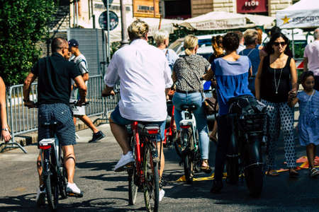 Rome Italy September 29, 2019 View of unknowns tourist visiting the city of Rome in bicycle in the eveningのeditorial素材