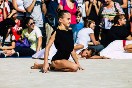Rome Italy September 29, 2019 Celebrations of the 150th anniversary of the Italian gymnastics federation, public demonstration of young gymnasts in the streets of Rome near the Coliseumのeditorial素材
