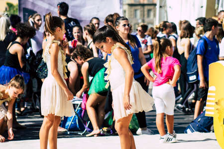 Rome Italy September 29, 2019 Celebrations of the 150th anniversary of the Italian gymnastics federation, public demonstration of young gymnasts in the streets of Rome near the Coliseumのeditorial素材