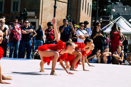 Rome Italy September 29, 2019 Celebrations of the 150th anniversary of the Italian gymnastics federation, public demonstration of young gymnasts in the streets of Rome near the Coliseumのeditorial素材