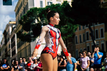 Rome Italy September 29, 2019 Celebrations of the 150th anniversary of the Italian gymnastics federation, public demonstration of young gymnasts in the streets of Rome near the Coliseumのeditorial素材