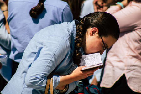 Jerusalem Israel October 06, 2019 View of unknowns Israeli young girls praying front the Western wall in the Old city of Jerusalem in the afternoonのeditorial素材