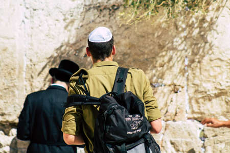 Jerusalem Israel October 06, 2019 View of unknowns Israeli soldiers praying front the Western wall in the Old city of Jerusalem in the afternoonのeditorial素材