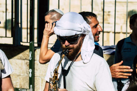 Jerusalem Israel October 06, 2019 View of unknown Israeli people playing music for a religious ceremony at the entry of the Western wall in the Old city of Jerusalem in the afternoonのeditorial素材