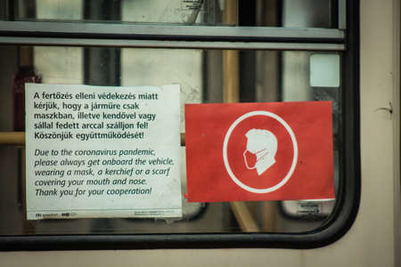 Budapest Hungary july 11, 2020 View of a traditional Hungarian electric tram for passengers driving through the streets and part of the public transport system of Budapest, the capital of Hungaryのeditorial素材