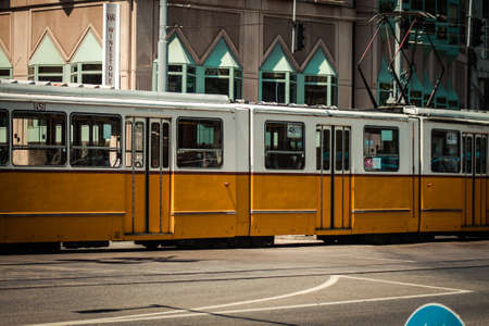Budapest Hungary july 11, 2020 View of a traditional Hungarian electric tram for passengers driving through the streets and part of the public transport system of Budapest, the capital of Hungaryのeditorial素材