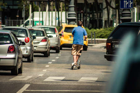 Budapest Hungary july 11, 2020 View of unidentified people rolling with a electric scooters in the...