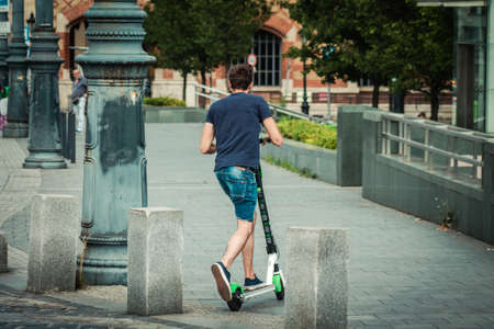 Budapest Hungary july 11, 2020 View of unidentified people rolling with a electric scooters in the...