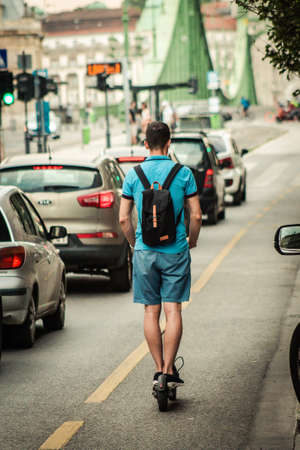 Budapest Hungary july 11, 2020 View of unidentified people rolling with a electric scooters in the streets of Budapestのeditorial素材