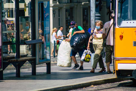 Budapest Hungary july 11, 2020 View of unidentified people taking the electric tram, part of the...