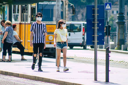 Budapest Hungary july 11, 2020 View of unidentified people taking the electric tram, part of the public transport system of Budapest, the capital of Hungaryのeditorial素材