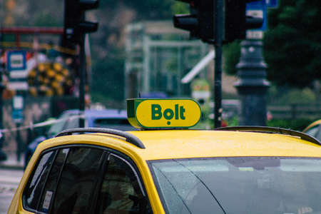 Budapest Hungary july 17, 2020 View of a traditional yellow Hungarian taxi for passengers driving...