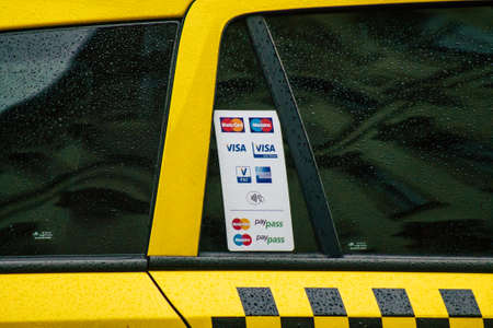 Budapest Hungary july 17, 2020 View of a traditional yellow Hungarian taxi for passengers driving through the streets of Budapest the capital of Hungaryのeditorial素材