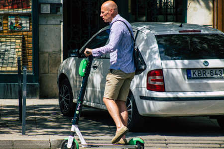 Budapest Hungary july 15, 2020 View of unidentified people rolling with a electric scooters in the streets of Budapest the capital and the most populous city of Hungaryのeditorial素材